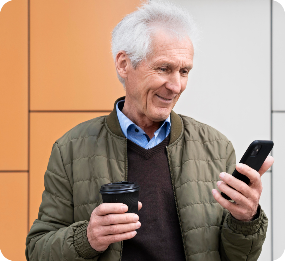 Senior man using phone